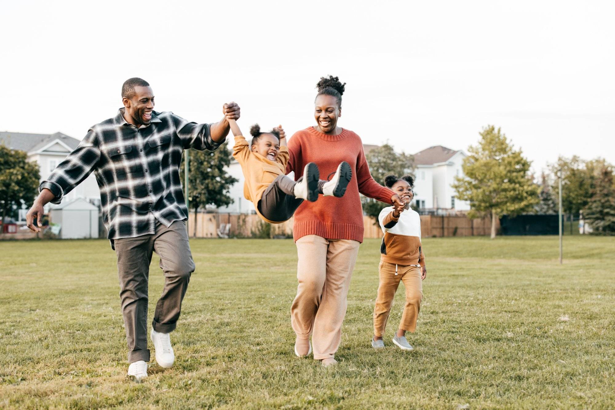 Family enjoying springtime outdoors with kids